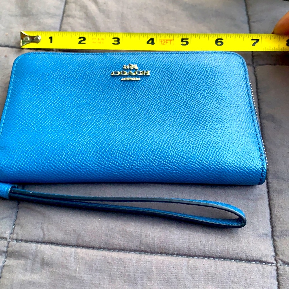 Blue coach wristlet.